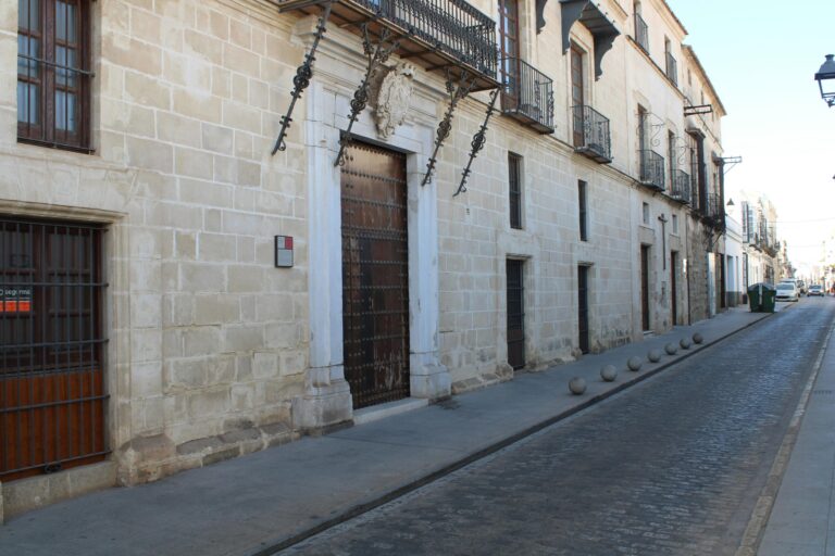 Charming stone building facade in El Puerto de Tazacorte, vibrant historical architecture.